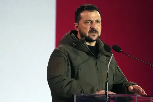 Ukrainian President Volodymyr Zelenskyy holds a speech during his visit to Warsaw, Poland, April 5, 2023. Ukraine is promising to investigate a gruesome video circulating on social media that purportedly shows the beheading of a Ukrainian soldier. Zelenksyy on Wednesday, April 12 blamed Russia and said the violence would not be forgotten, while the Kremlin called the footage “horrible” but said it needed to be verified.(AP Photo/Czarek Sokolowski, file)