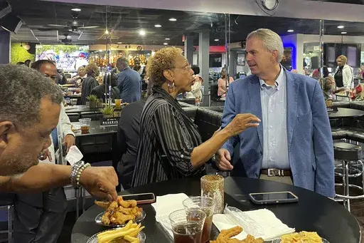 Mississippi Democratic gubernatorial nominee Brandon Presley speaks to voters at a meet-and-greet campaign event for Black women, Friday, Oct. 6, 2023, in Jackson, Miss. (AP Photo/Michael Goldberg)