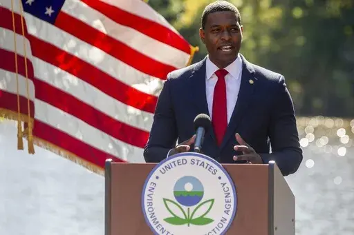 Michael Regan, the head of the Environmental Protection Agency, announces the Biden administration is launching a broad strategy to regulate toxic industrial compounds associated with serious health conditions that are used in products ranging from cookware to carpets and firefighting foams during an event at N.C. State University, Oct. 18, 2021, in Raleigh, N.C. The EPA on Tuesday, March 14, 2023, proposed limiting the amount of harmful “forever chemicals” in drinking water to the lowest le