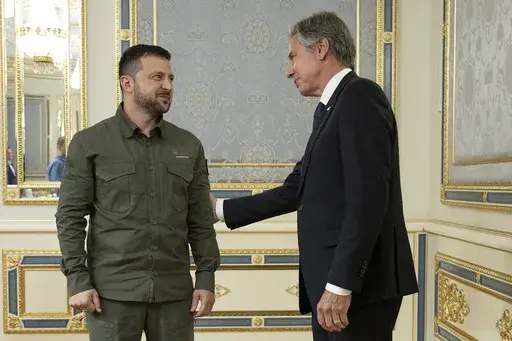 Ukraine's President Volodymyr Zelenskyy greets U.S. Secretary of State Antony Blinken before a meeting at Bankova in Kyiv, Ukraine, Wednesday, Sept. 6, 2023. (Brendan Smialowski/Pool via AP)