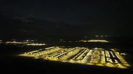 Amazon Web Services data center is seen at night on Thursday, Aug. 22, 2024, in Boardman, Ore. (AP Photo/Jenny Kane)