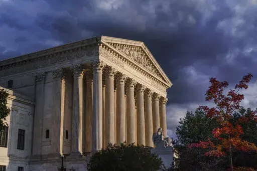 FILE - The Supreme Court is seen at dusk in Washington, Oct. 22, 2021. (AP Photo/J. Scott Applewhite, File)