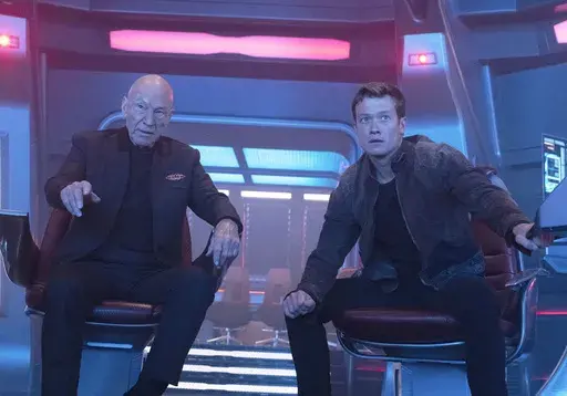 This image released by Paramount+ shows Patrick Stewart as Picard, left, and Ed Speleers as Jack Crusher in the "No Win Scenario" episode of "Star Trek: Picard." (Trae Patton/Paramount+ via AP)
