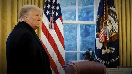 This exhibit from video released by the House Select Committee, shows a photo of President Donald Trump with his coat on as he returns to the Oval Office of the White House in Washington, after speaking on the Ellipse on Jan. 6, 2021. Former President Donald Trump repeatedly declined in an interview aired Sunday, Sept. 17, 2023, to answer questions about whether he watched the Capitol riot unfold on television, saying he would “tell people later at an appropriate time.” (House Select Committ