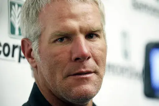 Former NFL quarterback Brett Favre speaks with reporters prior to his induction to the Mississippi Hall of Fame in Jackson, Miss., Aug. 1, 2015. Mississippi's state auditor filed court papers Monday, Feb. 5, 2024, renewing his call for Favre to repay the state for welfare money that the auditor says was improperly spent on projects backed by the retired NFL quarterback. (AP Photo/Rogelio V. Solis, File)