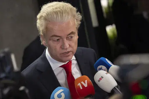 Geert Wilders, leader of the far-right party PVV, or Party for Freedom, talks to the media after a meeting with speaker of the House Vera Bergkamp, two days after Wilders won the most votes in a general election, in The Hague, Netherlands, on Nov. 24, 2023. Two days of behind-closed doors talks between four Dutch political leaders appear to have forced a breakthrough in negotiations to form a new ruling coalition nearly four months after a general election won by Wilders. While the exact contour