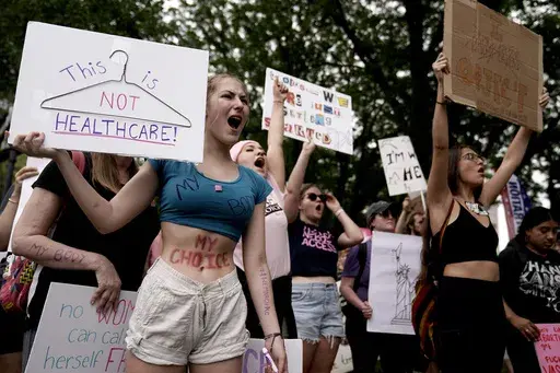 People rally in support of abortion rights, July 2, 2022, in Kansas City, Mo. Legislative efforts in Missouri and Mississippi this week are attempting to prevent voters from having a say over abortion rights, building on anti-abortion strategies seen in other states, including last year in Ohio. (AP Photo/Charlie Riedel, File)