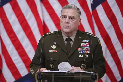 Chairman of the Joint Chiefs of Staff Gen. Mark Milley speaks during a media conference after a meeting of NATO defense ministers at NATO headquarters in Brussels, Oct. 12, 2022. This winter could provide both Russia and Ukraine an opportunity to negotiate a peace after eight months of fighting that has killed tens of thousands of people on both sides, Milley said on Nov. 9. (AP Photo/Olivier Matthys, File)