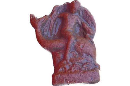 This undated photo shows a terracotta figurine of Eros riding a dolphin found in a newly discovered sanctuary, which dates from the 5th century B.C., that was first identified in 2019 along the ancient city walls of Paestum, Southern Italy. The excavations of the sanctuary in the ancient city of Paestum have unearthed seven terracotta bull heads and a figurine of Eros riding a dolphin that shines new light on the religious life and rituals of the ancient Greek city, culture ministry officials sa