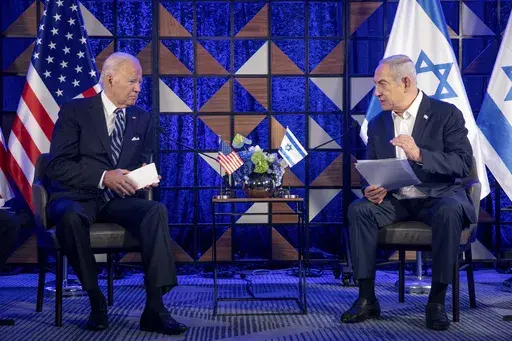 U.S. President Joe Biden, left, meets with Israeli Prime Minister Benjamin Netanyahu, right, to discuss the the war between Israel and Hamas, in Tel Aviv, Israel, on Oct. 18, 2023. The United States has offered strong support to Israel in its war against Hamas. But the allies ar increasingly at odds over what will happen to the Gaza Strip once the war winds down. (Miriam Alster/Pool Photo via AP)