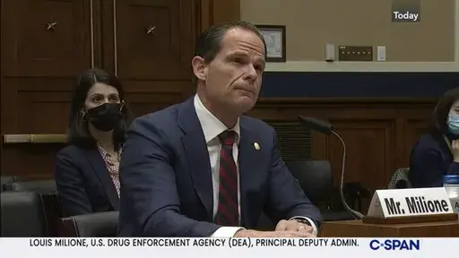 In this image from video provided by C-SPAN, Louis Milione, the U.S. Drug Enforcement Administration's deputy administrator, speaks during a hearing held by the House Energy and Commerce Subcommittee on Health in Washington on Dec. 2, 2021. Milione, the DEA’s second-in-command, quietly resigned in 2023, amid reporting by The Associated Press that he previously consulted for a pharmaceutical distributor sanctioned for a deluge of suspicious painkiller shipments and did similar work for the drug
