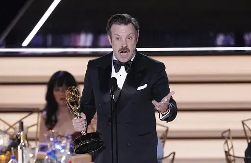 Jason Sudeikis accepts the Emmy for outstanding lead actor in a comedy series for "Ted Lasso" at the 74th Primetime Emmy Awards on Monday, Sept. 12, 2022, at the Microsoft Theater in Los Angeles. (AP Photo/Mark Terrill)