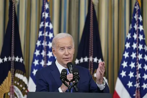 President Joe Biden speaks in the State Dining Room of the White House in Washington, Wednesday, Nov. 9, 2022. On Friday, April 7, 2023, The Associated Press reported on stories circulating online incorrectly claiming a video shows Biden essentially confirming that his team coordinated the indictment of former President Donald Trump to “stop Trump from taking power again.” (AP Photo/Susan Walsh, File)