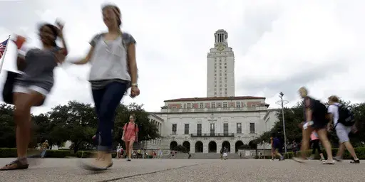Students walk on the University of Texas campus in Austin, Texas., Sept. 27, 2012. (AP Photo/Eric Gay, File)