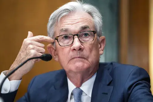 Federal Reserve Chairman Jerome Powell testifies before the Senate Banking Committee hearing, Thursday, March 3, 2022 on Capitol Hill in Washington. Powell said Wednesday, March 23, that new forms of digital money such as cryptocurrencies and stablecoins present risks to the financial systems and will require new rules to protect consumers. (Tom Williams, Pool via AP, File)