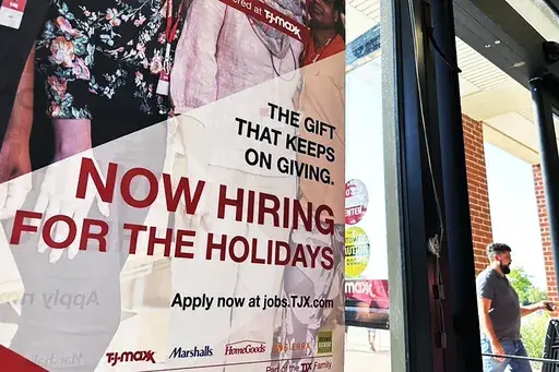 A hiring sign is displayed at a retail store in Vernon Hills, Ill., Thursday, Aug. 31, 2023. A year ago, Chair Jerome Powell warned that the Fed was prepared to be similarly aggressive toward high inflation, saying its rate hikes would cause “some pain” in the form of higher unemployment. Over time, as the job market has displayed surprising resilience, Powell has adopted a more benign tone. At a news conference last week, he suggested that a soft landing remains a “possible," if not guara