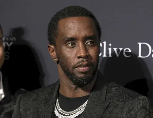 Sean Combs arrives at the Pre-Grammy Gala And Salute To Industry Icons at the Beverly Hilton Hotel on Saturday, Jan. 25, 2020, in Beverly Hills, Calif. (Photo by Mark Von Holden/Invision/AP, File)