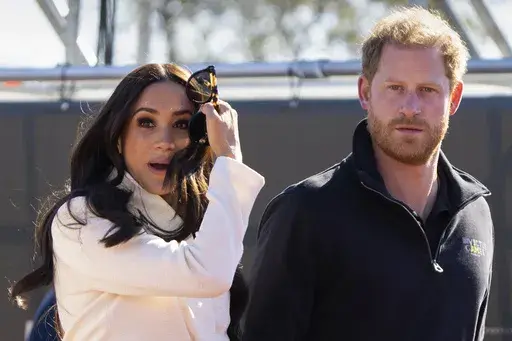 Prince Harry and Meghan Markle, Duke and Duchess of Sussex visit the track and field event at the Invictus Games in The Hague, Netherlands, Sunday, April 17, 2022. The production company founded by Prince Harry and his wife, Meghan, are splitting ways with Spotify, Friday, June 16, 2023, less than a year after the debut of their podcast “Archetypes."(AP Photo/Peter Dejong, File)
