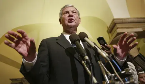 Senate Intelligence Committee Chairman Sen. Bob Graham, D-Fla., gestures as he answers questions regarding the ongoing security hearing on Capitol Hill, June 18, 2002, in Washington. Graham, who chaired the Intelligence Committee following the 2001 terrorist attacks and opposed the Iraq invasion, has died, according to an announcement by his family Tuesday, April 16, 2024. (AP Photo/Pablo Martinez Monsivais, File)
