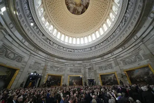 JD Vance is sworn in as vice president by Supreme Court Justice Brett Kavanaugh as Usha Vance holds the Bible during the 60th Presidential Inauguration in the Rotunda of the U.S. Capitol in Washington, Monday, Jan. 20, 2025. (AP Photo/Julia Demaree Nikhinson, Pool)