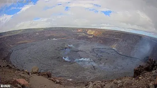 This webcam image provided by the U.S. Geological Survey shows the summit of the Kilauea volcano in Hawaii, Tuesday, June 20, 2023. An eruption of the Hawaii volcano that began nearly two weeks earlier has come to a pause, scientists said. Kilauea, one of the most active volcanoes in the world, began erupting June 7 after a three-month pause, displaying fountains of glowing red lava without threatening any communities or structures. (U.S. Geological Survey via AP)