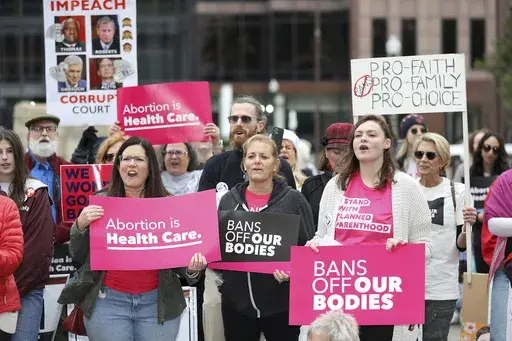 Supporters of Issue 1, the Right to Reproductive Freedom amendment, attend a rally in Columbus, Ohio, Oct. 8, 2023. Some state governments and a federal agency are moving to block companies from selling geolocation data that shows who's been to abortion providers, among other places. (AP Photo/Joe Maiorana, File)