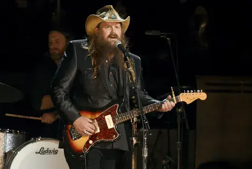 Chris Stapleton performs at the 50th annual CMA Awards in Nashville, Tenn., on Nov. 2, 2016. Stapleton will perform at this year’s New Orleans Jazz & Heritage Festival. (Photo by Charles Sykes/Invision/AP, File)