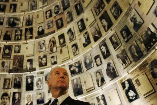 Then-Vice President Joseph Biden visits the Hall of Names at the Yad Vashem Holocaust memorial in Jerusalem, March 9, 2010. President Joe Biden has spent decades as a stalwart supporter of Israel, a connection rooted in dinner table conversations with his father about the Holocaust. Now his devotion is back in the spotlight after last week's Hamas attacks that caused the largest loss of Jewish life in a single day since the Holocaust. (AP Photo/Ariel Schalit, File)