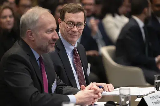 Richard C. Visek, acting legal adviser of the U.S. Department of state, second left, waits to address the United Nations' highest court during historic hearings in The Hague, Netherlands, Wednesday, Feb. 21, 2024, into the legality of Israel's 57-year occupation of the West Bank and east Jerusalem, plunging the 15 international judges back into the heart of the decades-long Israeli-Palestinian conflict. Six days of hearings at the International Court of Justice, during which an unprecedented num
