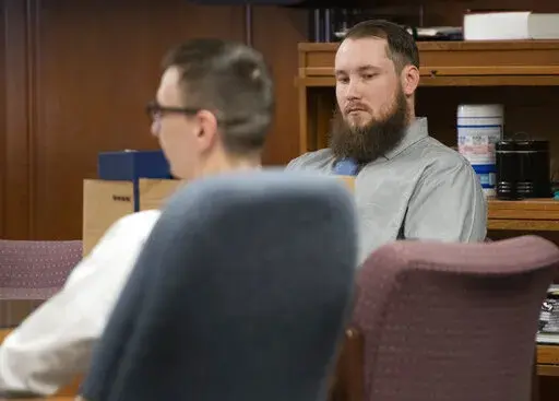 Joseph Morrison appears before Jackson County Circuit Court Judge Thomas Wilson on Wednesday, Oct. 5, 2022 for trial in Jackson, Mich. Paul Bellar, Joseph Morrison and Pete Musico are charged in connection with a 2020 anti-government plot to kidnap Michigan Gov. Gretchen Whitmer. (J. Scott Park/Jackson Citizen Patriot via AP, Pool)