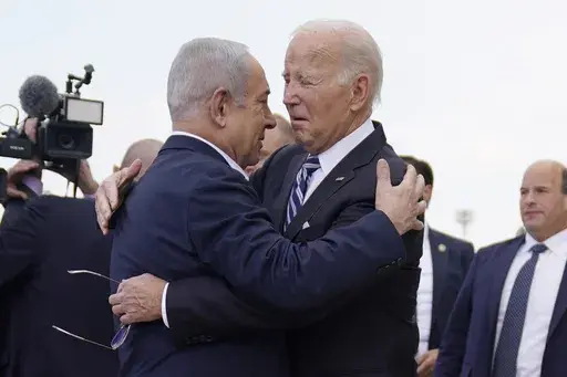 President Joe Biden is greeted by Israeli Prime Minister Benjamin Netanyahu after arriving at Ben Gurion International Airport, on Oct. 18, 2023, in Tel Aviv. Biden's administration keeps pressing Israel for better treatment of Palestinians. Netanyahu mostly keeps saying no. That cycle seems unlikely to end, despite U.S. Secretary of State Antony Blinken's fourth urgent diplomatic trip this week to the Middle East since the Israel-Hamas war started. (AP Photo/Evan Vucci)