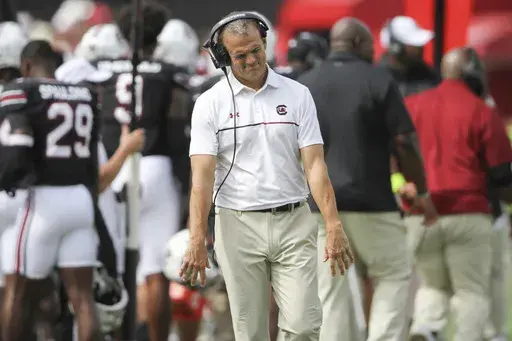 South Carolina head coach Shane Beamer shows some frustrations with the calls against his team during the second half of an NCAA college football game against LSU Saturday, Sept. 14, 2024 in Columbia, S.C. (AP Photo/Artie Walker Jr.)