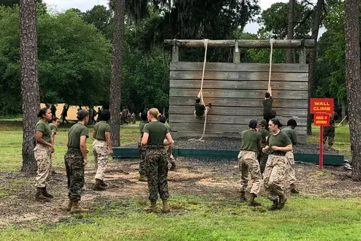 Female Marines go through one of the obstacles in the so-called confidence course at Parris Island Recruit Depot, S.,C., on May 27, 2020. (AP Photo/Lolita Baldor, File)