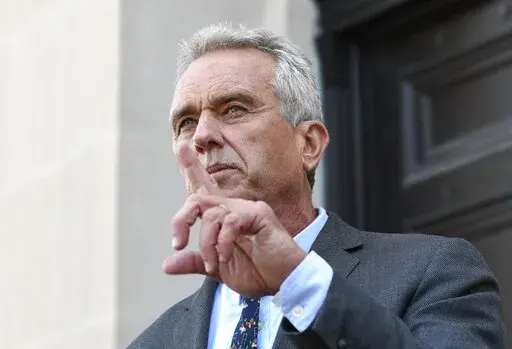 Robert F. Kennedy, Jr. speaks after a hearing challenging the constitutionality of the state legislature's repeal of the religious exemption to vaccination on behalf of New York state families who held lawful religious exemptions, during a rally outside the Albany County Courthouse, Aug. 14, 2019, in Albany, N.Y.  Kennedy is apologizing for suggesting things are worse for people today than they were for Anne Frank, the teenager who died in a Nazi concentration camp after hiding with her family i