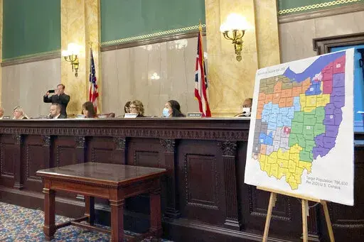 FILE—Members of the Ohio Senate Government Oversight Committee hear testimony on a new map of state congressional districts in this file photo from Nov. 16, 2021, at the Ohio Statehouse in Columbus, Ohio. On Friday, Jan. 14, 2022, the Ohio Supreme Court rejected a new map of the state's 15 congressional districts as gerrymandered, sending the blueprint back for another try. The 4-3 decision returns the process to the powerful Ohio Redistricting Commission. (AP Photo/Julie Carr Smyth, File)