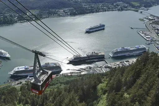 Cruise ships are shown near downtown Juneau on June 7, 2023, along the Gastineau Channel, in Alaska. Voters in Alaska's capital city could decide in October whether to ban large cruise ships on Saturdays starting next year. (AP Photo/Becky Bohrer, File)