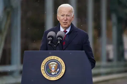 FILE - President Joe Biden speaks during a visit to the NH 175 bridge over the Pemigewasset River to promote infrastructure spending Nov. 16, 2021, in Woodstock, N.H. (AP Photo/Evan Vucci, File)