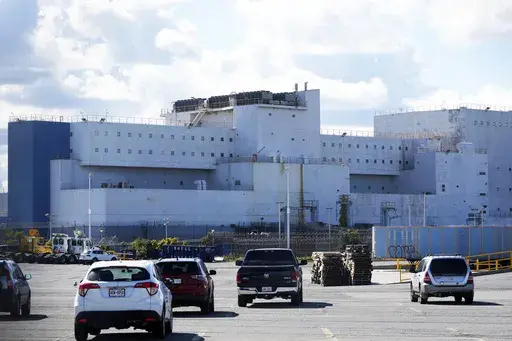 FILE — The Vernon C. Bain Correctional Center is seen docked in the Bronx borough of New York, Monday, Oct. 16, 2023. It arrived in 1992 as a temporary measure to ease overcrowding on Rikers Island, the city's main jail complex for detainees awaiting trial. Three decades later, the 800-bed lockup – believed to be the last operating prison ship in the United States — is finally closing down. (AP Photo/Seth Wenig, File)