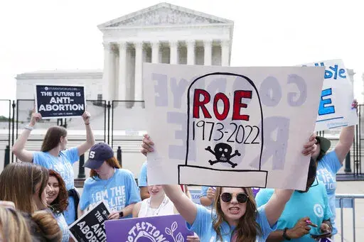 Demonstrators protest about abortion outside the Supreme Court in Washington, June 24, 2022. Nothing has undermined the GOP's momentum more than the Supreme Court's stunning decision to end abortion protections, which triggered a swift backlash even in the reddest of red states over the summer. (AP Photo/Jacquelyn Martin, File)