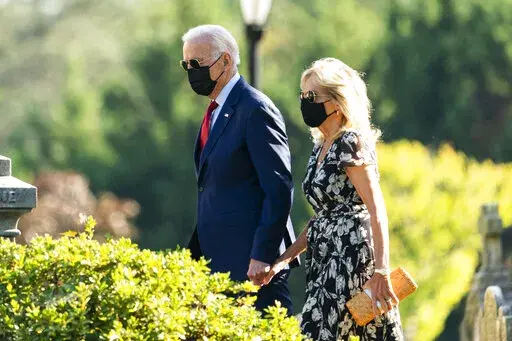 President Joe Biden and first lady Jill Biden leave St. Joseph on the Brandywine Catholic Church in Wilmington, Del., after attending a Mass, Saturday, Sept. 4, 2021. (AP Photo/Manuel Balce Ceneta)