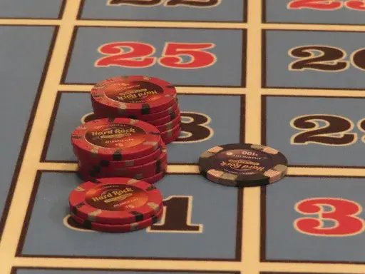 Chips sit on a roulette table at the Hard Rock casino in Atlantic City N.J., on May 17, 2023. With large numbers of high school students saying they are already gambling with friends or online before they are old enough to do so legally, several states are moving to require classes on the risks of gambling as part of high school curriculum. (AP Photo/Wayne Parry)