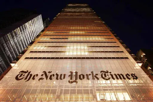 The New York Times building is shown on Oct. 21, 2009, in New York. The New York Times is bracing for a 24-hour walkout Thursday, Dec. 8, 2022, by hundreds of journalists and other employees, in what would be the first strike of its kind at the newspaper in more than 40 years. (AP Photo/Mark Lennihan, File)