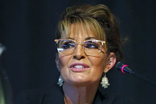 Sarah Palin, a Republican seeking the sole U.S. House seat in Alaska, speaks during a forum for candidates May 12, 2022, in Anchorage, Alaska. Palin is in two elections on Tuesday, Aug. 16. She is one of three candidates in a special election vying to fill the remainder of U.S. Rep. Don Young's term after he died in March. She's also in the U.S. House primary, seeking a full two-year term. (AP Photo/Mark Thiessen, File)
