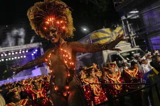 Drum queen Mayara Lima from Paraiso do Tuiuti samba school performs during Carnival celebrations at the Sambadrome in Rio de Janeiro, Brazil, Tuesday, Feb. 13, 2024. (AP Photo/Silvia Izquierdo)