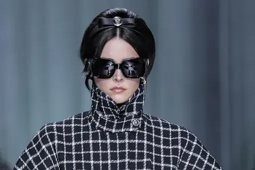 A model wears a creation as part of the Versace women's Spring Summer 2024 collection presented in Milan, Italy, Friday, Sept. 22, 2023. (AP Photo/Antonio Calanni)