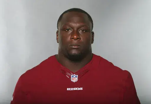 Jerrell Powe, of the Washington Redskins, poses for a photo in June 2016. Powe, a former University of Mississippi and NFL football player has been arrested in Mississippi on kidnapping charges. He remained jailed Monday, Jan. 16, 2023, in the Jackson, Miss., suburb of Ridgeland, Miss., with no bail set. It is unclear if he has a lawyer to speak for him. (AP Photo, File)
