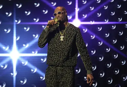 Snoop Dogg performs a tribute to Dr. Dre at the Black Music Collective on Thursday, Feb. 2, 2023, at The Hollywood Palladium in Los Angeles. Asking for privacy, hip-hop legend and longtime marijuana enthusiast Snoop Dogg says he's going to stop smoking — though he didn't specify exactly what that might mean. "After much consideration and conversation with my family, I've decided to give up smoke," Snoop wrote in a message shared on Instagram and X, the platform formerly known as Twitter, on Th