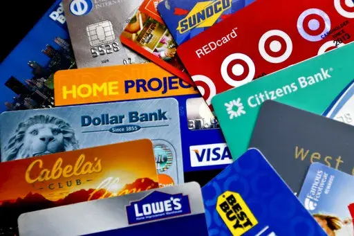 In this Jan. 31, 2018, photo, an assortment of credit cards and rewards cards are shown in Zelienople, Pa. Using the right credit cards for your purchases can help you save money and maximize your benefits. But there are many times a credit card can be the wrong fit for a specific purchase or goal. Here are eight mistakes not to make when it comes to using credit cards.  (AP Photo/Keith Srakocic, File)