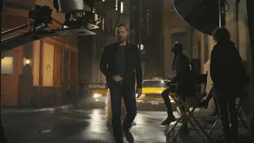 This photo provided by Expedia shows a scene from Expedia's 2022 Super Bowl NFL football spot. (Expedia via AP)