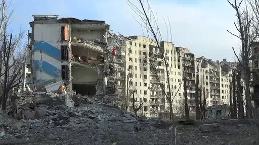 This photo taken from video released by the head of the Russian-controlled Donetsk region Denis Pushilin's telegram channel on Saturday, Feb. 24, 2024, shows damaged buildings, after Russian forces completed their takeover of Avdiivka, eastern Ukraine. Russian-controlled Donetsk region. (Head of the Russian-controlled Donetsk region Denis Pushilin telegram channel via AP)